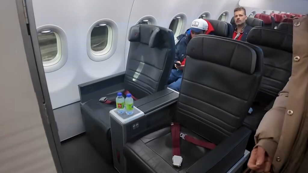 Executiva da Air Canada Rouge com milhas